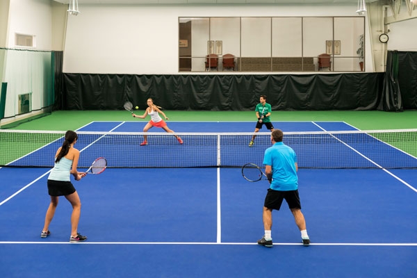 Playing tennis at the Four Seasons Resort Las Colinas Texas